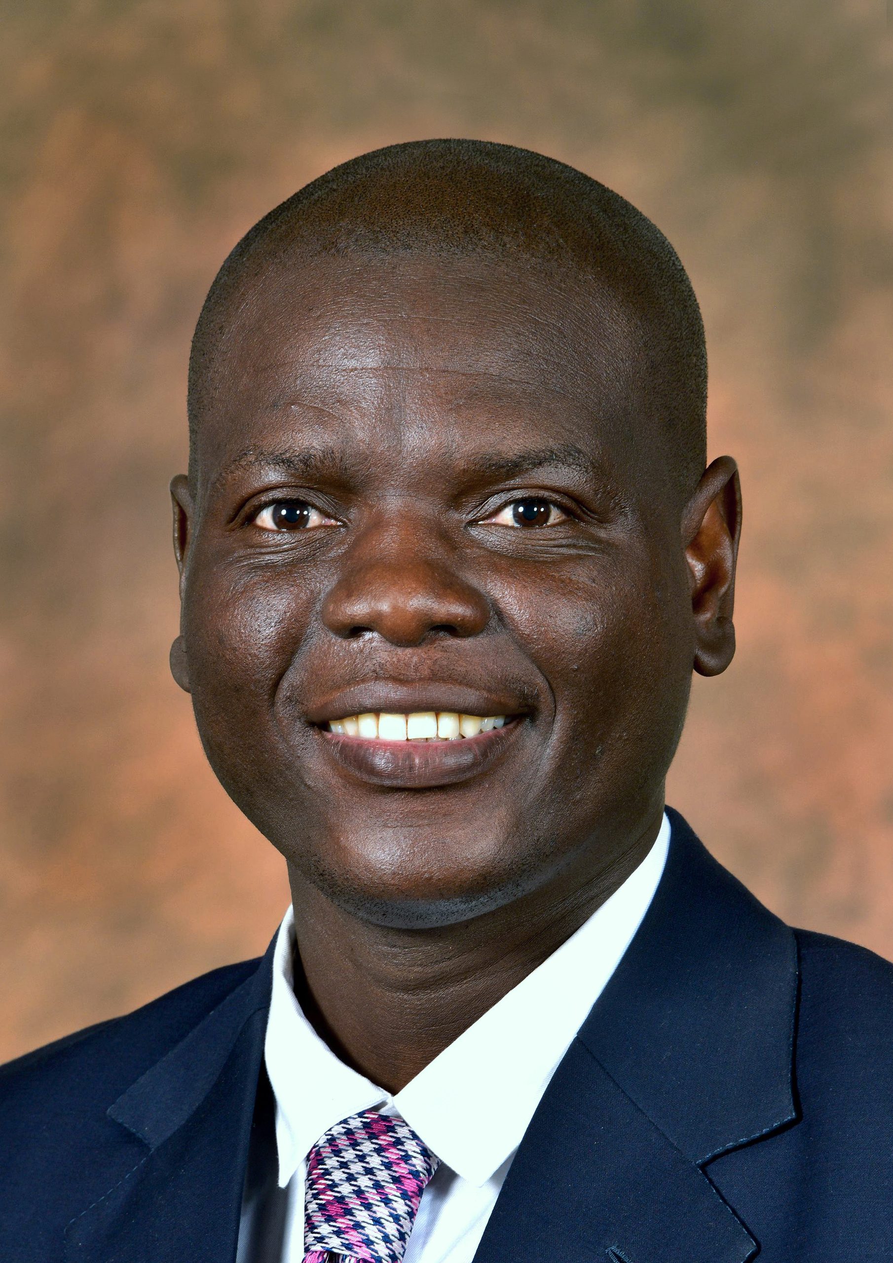 Min-Lamola-approved-off-portrait-2024-F-scaled.jpg